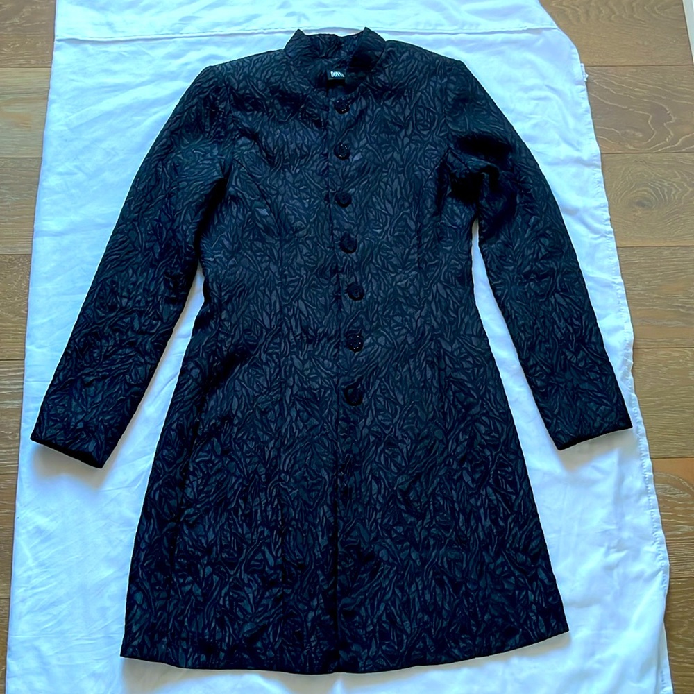 Classic  black trench coat- fully lined. With beautiful shiny black bottons